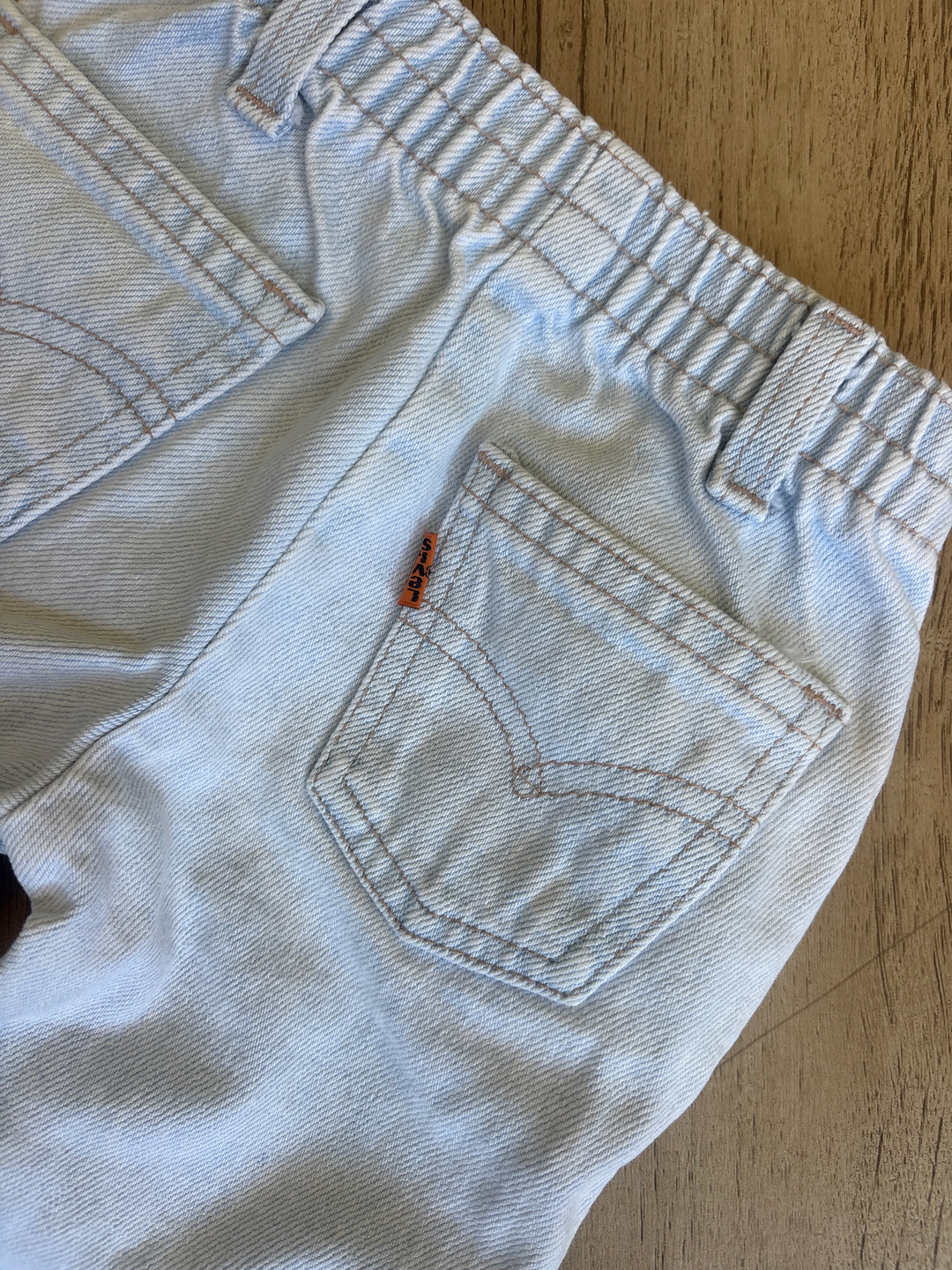 Baby’s first orange tab Levi’s