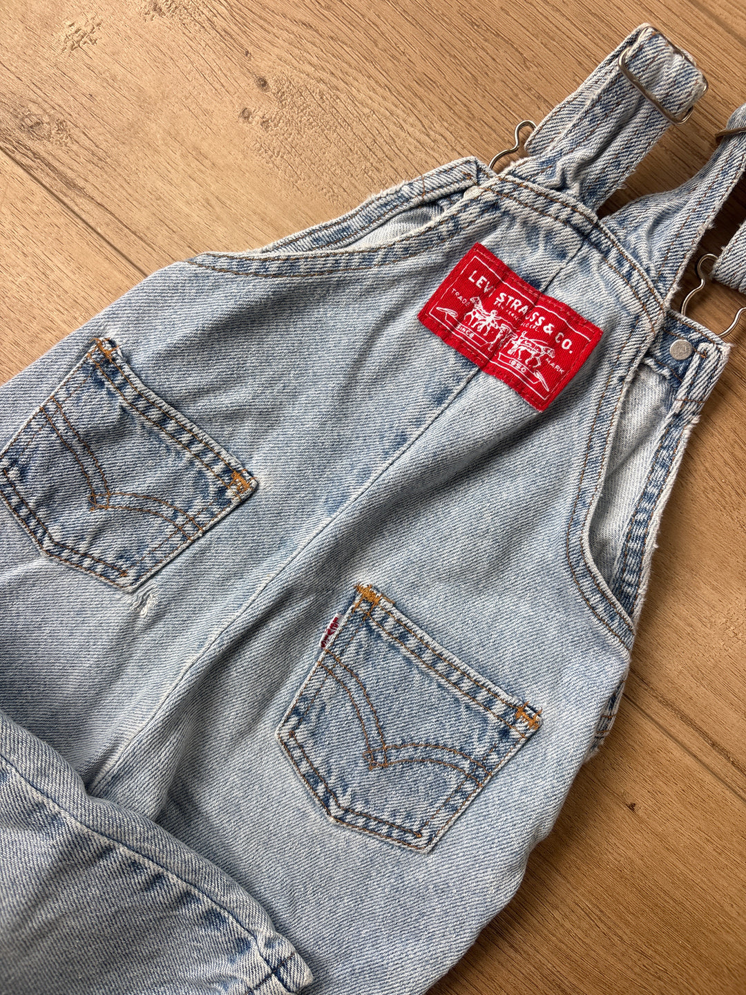 White tab & red button vintage Levi overalls