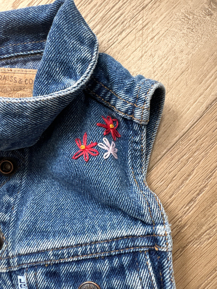 White tab vintage Levi vest with hand floral embroidery