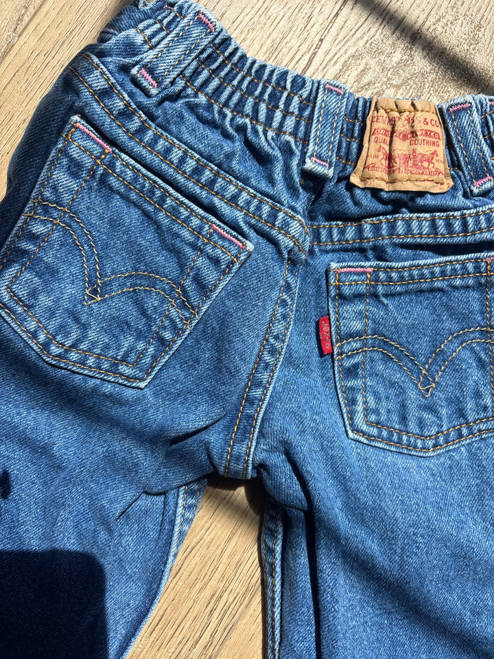 Teeny vintage Levi’s with pink stitching