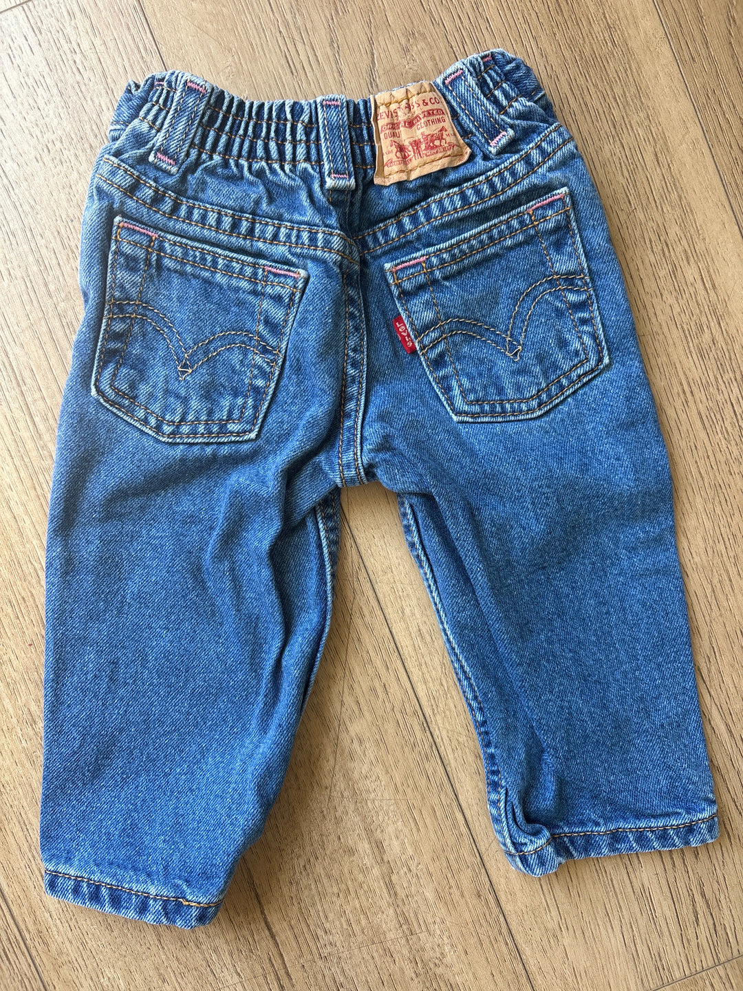 Teeny vintage Levi’s with pink stitching