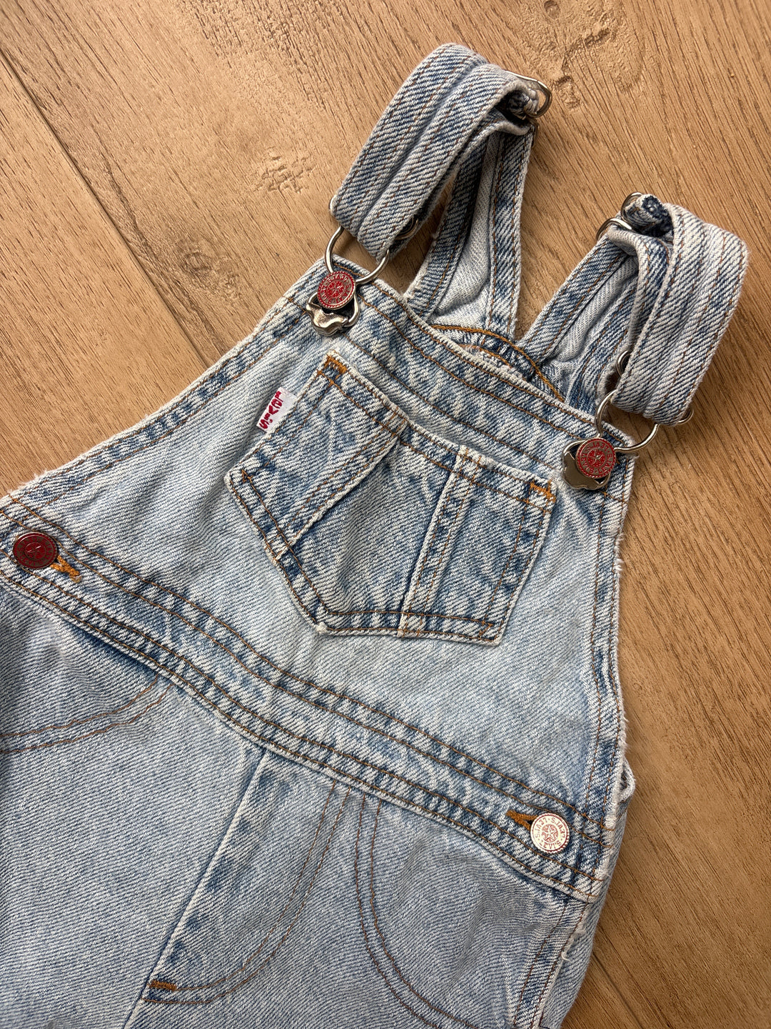 White tab & red button vintage Levi overalls