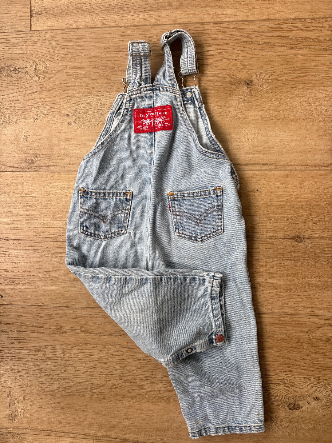 White tab & red button vintage Levi overalls